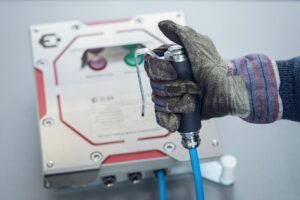 Operator control with push button and cable